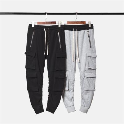 China Viable Military Multi-Pocket Ruched Sweatpants Kanye Cotton Jogger Pants In Stock Custom Men Pants for sale