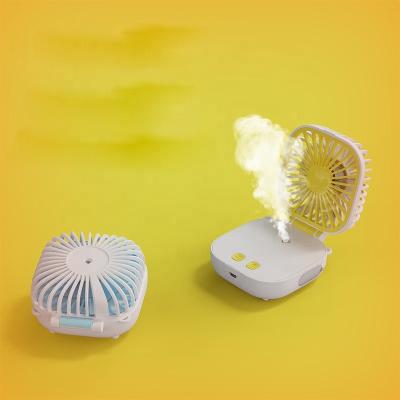 China Fan With Mini Portable Handheld Rechargeable Humidifier Fan Water Mist Spray Fan With Spray Timing Function for sale