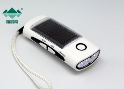 China Portable Outdoor Solar Flashlight Radio Emergency AM FM Weather Radio for sale