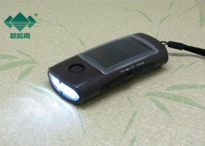 China Ultra Bright Led Solar Powered Hand Crank Flashlight Radio Smartphone Am Fm Radio for sale