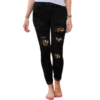 China QUICK DRY women's skinny jeans with holes and leopard print patches stretch jeans with skinny pencil pants for sale