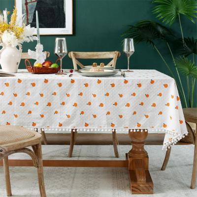 China Modern home decorative 100% cotton printed fruit jacquard orange square dinner tablecloth with plush ball for sale