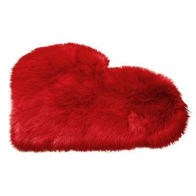 China Heart Shape Faux Sheepskin Rugs Modern Decorative Soft Plush Long Blanket Non Slip Home Lint Carpets Non Slip for sale