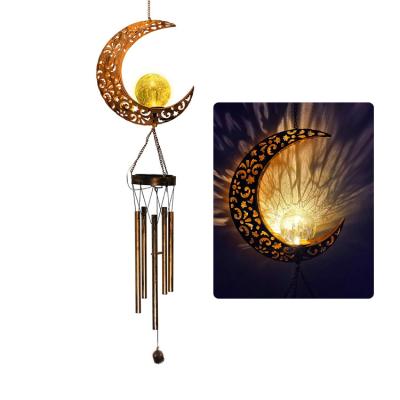 China Outdoor Metal Wind Bell Moon Shape Slot Hanging Solar Wind Chimes for sale