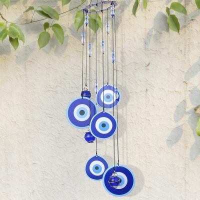 China Creative Country Patio Decoration Alloy Wind Bell Blue Exorcism Evil Eye Wind Chime for sale