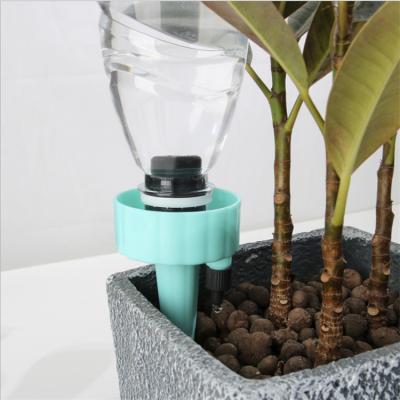 China No Need To Make Holes Below Spikes Bottle Automatic Drip Irrigation Self Watering Device With Slow Release Control Valve for sale