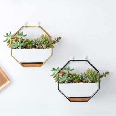 China Europe 2021 new design octagon flower pot metal frame wall hanging ceramic flower pots for sale