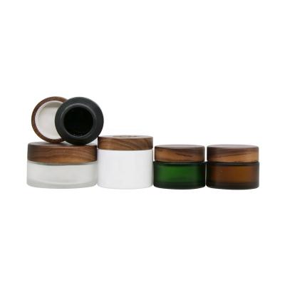 China Household Amber Wooden Lid Jars Glass Wooden Cosmetic Jar Knocks Wooden Lid for sale