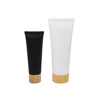 China Cosmetics Customized Personal Care Bamboo Lid Soft Tube For Facial Cleanser for sale