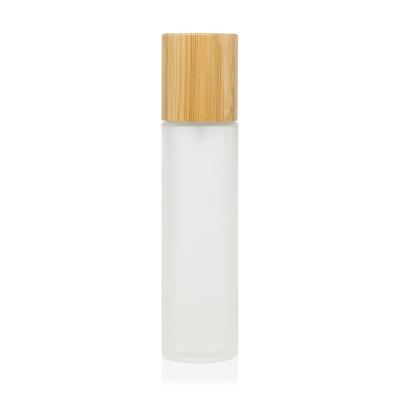 China Top End Cosmetic Bamboo Packaging Frosted Glass 150ml Bottle With Bamboo Pump for sale