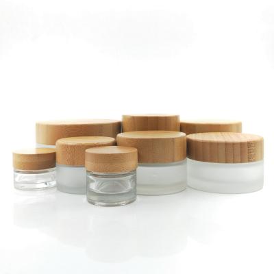 China Environment Customizable Size DOUBLE WALL Custom Glass Cosmetic Jar With Bamboo Lid for sale