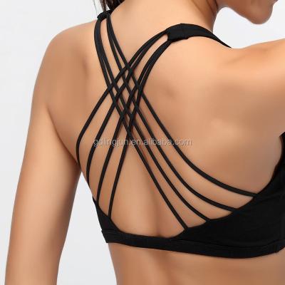 China OEM Brand Logo Activewear Gym Wear Padded Antibacterial Custom Women Sports Cross Bra Sports Yoga Band Workout Top Black Sexy Ladies Apparel for sale