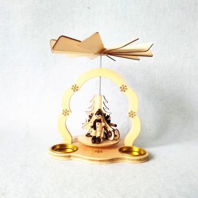 China Decorative Rotating Wooden Tea Light Candle Holder Christmas Rotating Pyramid For Gift for sale