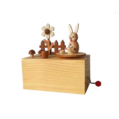 China 100% Handmade Mini Wooden Rotating Hand Crank Easter Music Box Decorations for sale