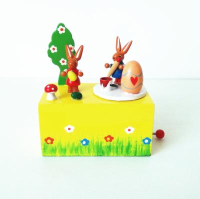 China Music Playing Easter Wooden Rabbit Music Box Rectangular Rotating Crank for sale