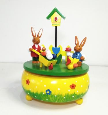 China Wooden Easter Decoration Handcrafted Rabbit Music Box Rotating Gifts For Easter for sale