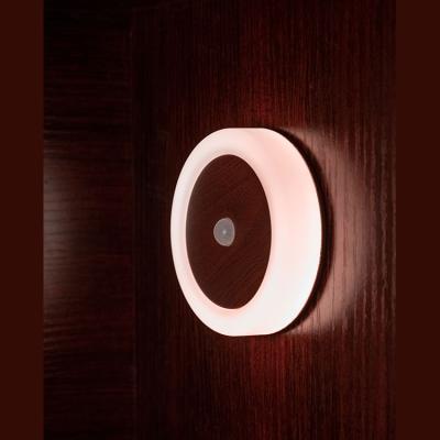 China Modern Portable Soft Silicone Copper Coin Sensor Lamp Walls Cabinets Rooms Stairs Night Lighting Led Motion Sensor Light for sale