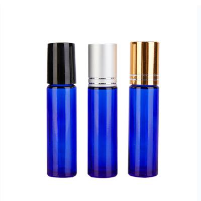 China Personal Care 10ml Rollball Empty Blue Glass Bottles For Essential Oils And Gold, Silver Lid And Black And White for sale