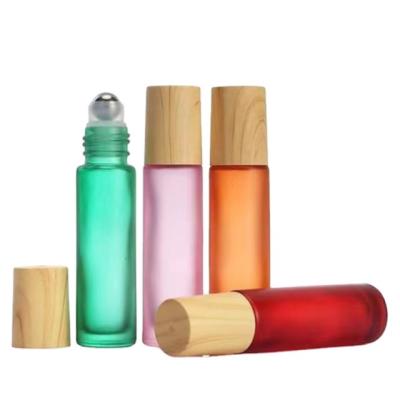 China Hot Red Color 10ml Cosmetic Bottle Pearl Glass Bead Bamboo Wood Steel Lid Ball Bearing for sale