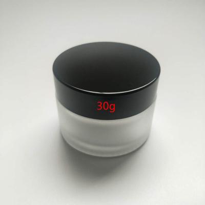 China Personal Care 30g Clear Frosted Glass Jar For Cosmetic With Silver Lid for sale