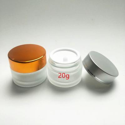 China Personal Care 20g Clear Frosted Body Cream Cosmetic Glass Jar With Gold Cap for sale