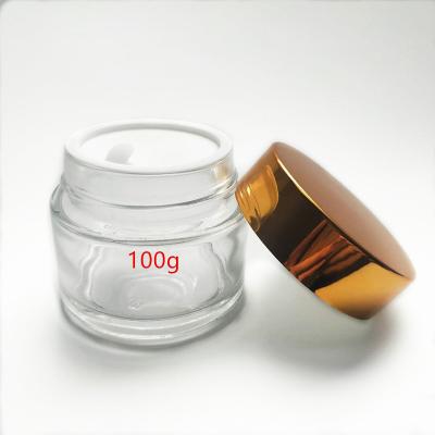 China Personal Care 100g Clear Glass Jar For Cosmetic With Silver Lid for sale