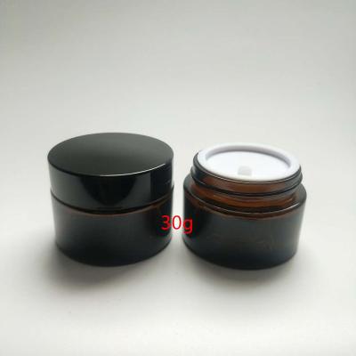 China Empty Personal Care 30g Amber Makeup Bottle With Gold Black Lid for sale