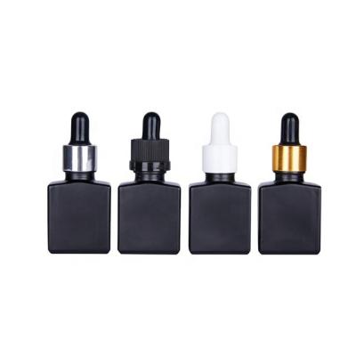 China 15ML Cosmetic Matte Black Glass Dropper Bottle Rectangular Glass Bottle With Child Safe Cap for sale