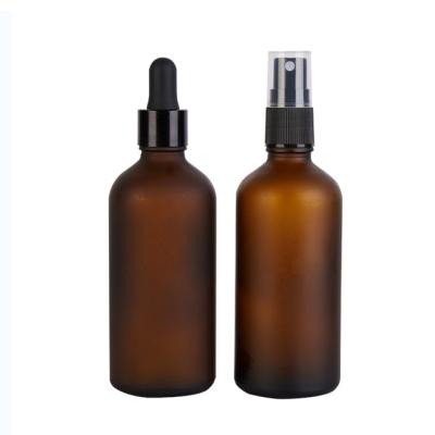 China Personal Care 100ml Frosted Amber Glass Cosmetic Serum Bottle With Black Dropper Cap And Black Spray Head for sale