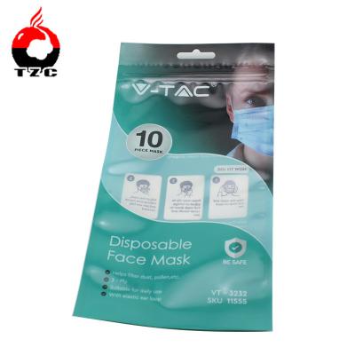 China Ziplock plastic barrier face mask packaging bag with hamhing hole for sale