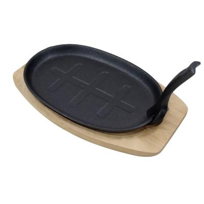 China Kitchen Restaurant Outdoor Bakery Factory Hot Sale BBQ Griddle Serving Dish Cookware Pre-seasoned Cast Iron Sizzling Plate with Wooden Base Fajita Pans for sale