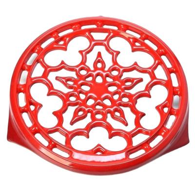 China Sustainable Factory Directly Sale Cast Iron Enamel Intricately Carved Colorful Trivet Mat Rubber Feet for sale