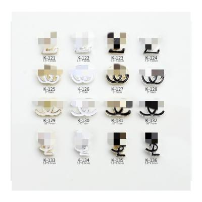 China LUXURY BRAND LOGO k121-136 Nail parts metal material multi color Oil dripping process with brand metal alloy logo nail art rhinestone charms for sale