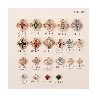 China ZIRCON Nail Decoration Four-leaf Clover Zircon Decoration Japanese Popular Online Red 2023 New Nail Hollow DIY Accessories for sale