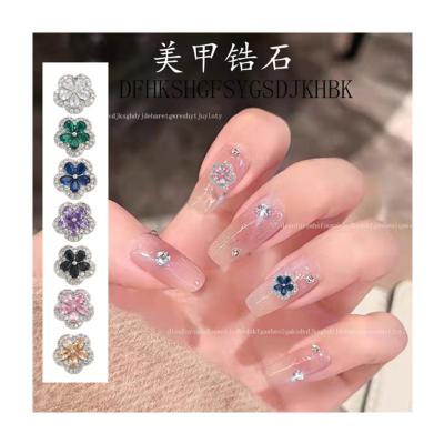 China Zircon Wholesale of new nail polish zircon jewelry with color retention, electroplating, genuine gold, and colored five petal nail diam for sale