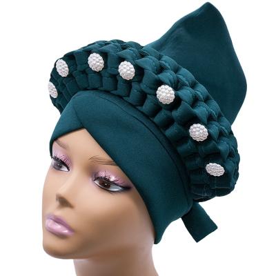 China DecorateÂ   2022 Muslim headwrap wholesale European and American popular Indian pearl hat large flower turban hat for sale