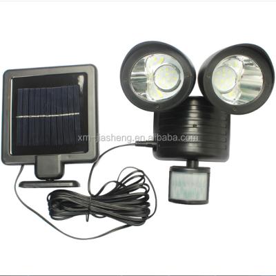 China Garden Outdoor Adjustable 22 Led Motion Sensor Solar Powered Dual Spotlight, Waterproof Yard Landscape Garden Spot Light for sale