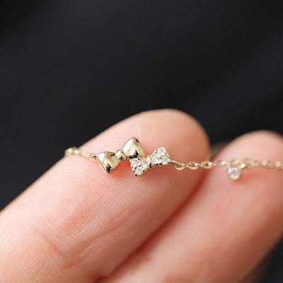 China Romantic Charm 925 Sterling Silver Gold Plated Mini Double Knot Bracelet For Women Girls for sale