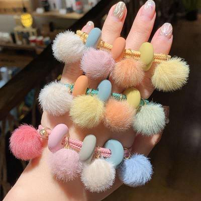 China High Quality Candy Color Cute Design Elastic Ponytail Holder Hair Tie With Hairy Ball For Women Girls for sale