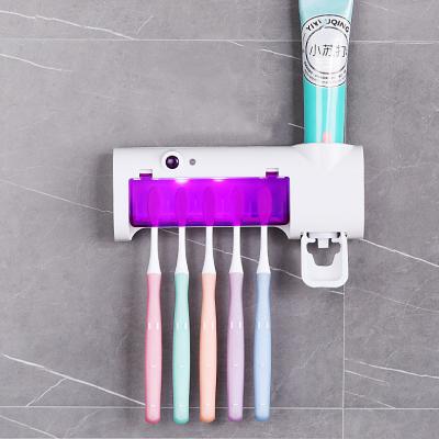 China Home.Hotel.Bathroom.Shower Room Guangzhou Toothpaste Holders Juicer Dispenser Sterilize Toothbrush Toothpaste Dispenser With Toothbrush Holder for sale