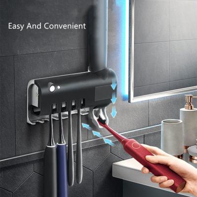 China Home.Hotel.Bathroom.Shower Room Bathroom Accessories Dispenser Toothpaste Disinfection Toothbrush Hands Free Sterilizer Sanitizing Toothbrush Holder and Charger for sale