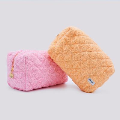 China Durable Customizable Terry Colors Large Capacity Warm Women Towel Quilted Cosmetic Bag for sale