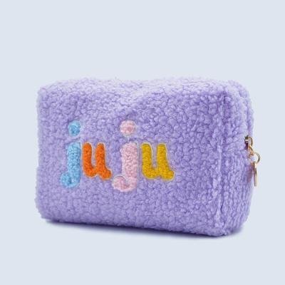 China Custom Logo Girl Mini Furry Teddy Cosmetic Bag Patch Fashion Letters Sherpa Zipper Soft Makeup Pouch for sale