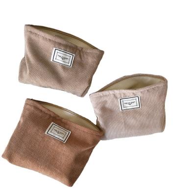 China Fashion Light Weight Solid Color Pocket Travel Zipper Soft Corduroy Cosmetic Makeup Bag Large For Women for sale