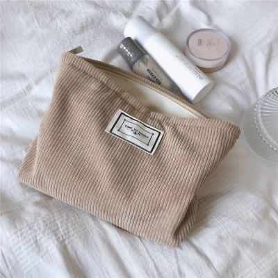 China Fashion Women Corduroy Makeup Travel Bag Soft Solid Pillow Zipper Cosmetic Organizer Pouch for sale