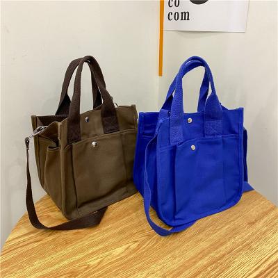 China Fashion 4 Multifunctional Solid Colors Custom Canvas Large Capacity Tote Shoulder Strap Women Handbag Waterproof for sale