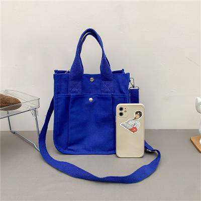 China 2022 Canvas One-Shoulder Multifunctional Large Capacity Messenger Bag Small Tote Bag Women for sale