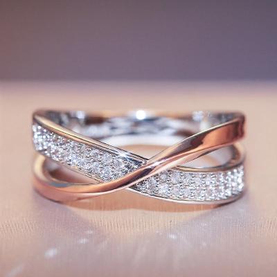 China 2022 Newest Cool Fashion Two Tone X Shape Cross Ring For Women Wedding Trendy Jewelry Shining Modern Rings for sale