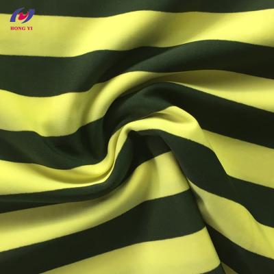 China Good Quality Soft Touch Black Stripe Print Yellow Swimwear Lycra Stretch Stretch Nylon Spandex Fabric for sale