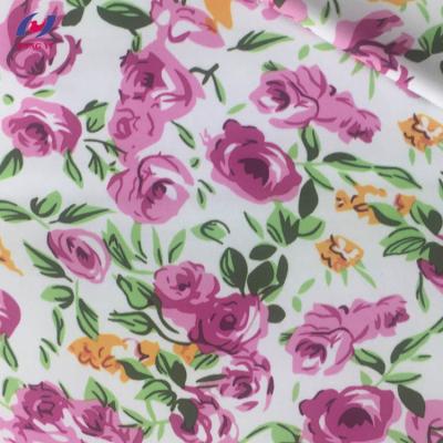 China Stretch Knitting 4 Way Stretch Flower Printed Polyester Spandex Swimwear Fabric for sale